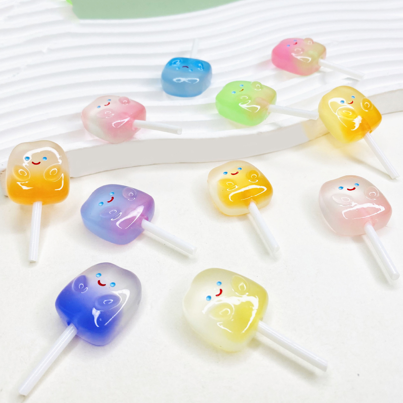 Wholesale of simulated lollipops, colorful smiling faces, luminous resin food and toy accessories, DIY handmade jewelry and accessory materials details Picture