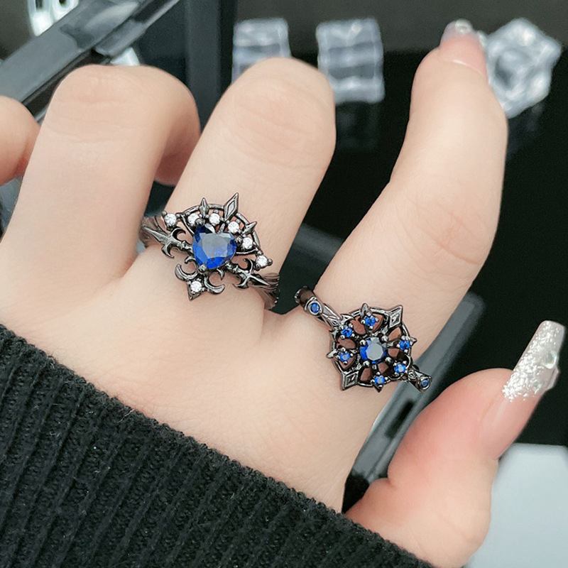 A trendy dark blue diamond open-top ring for women, a retro and niche individual bow and arrow hollowed-out punk style index finger ring full figure