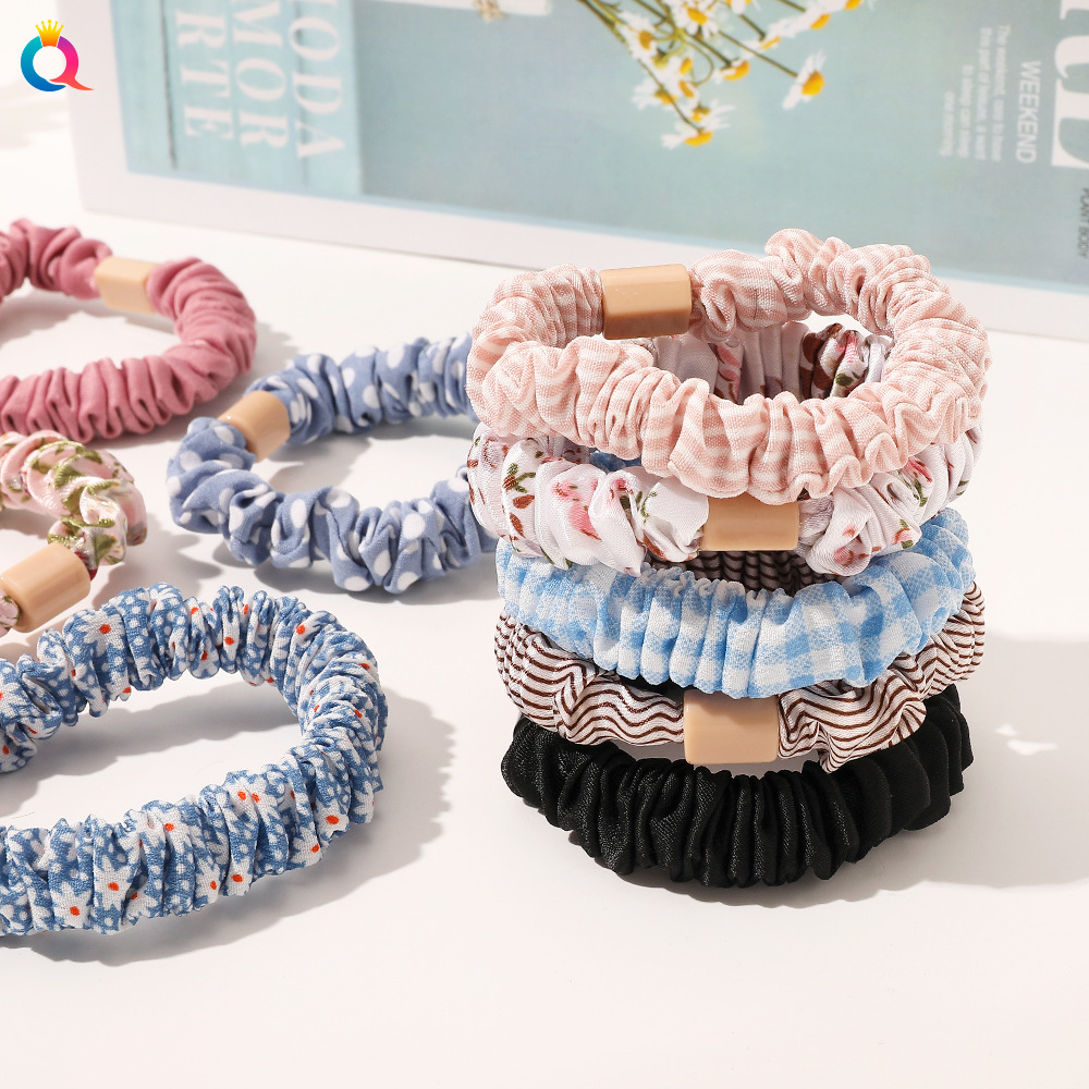 Qiyue Korean-style pleated large intestine hair band, fresh and solid color, fine hair rope, bun hair rope, ponytail hair band for women Application Scenario