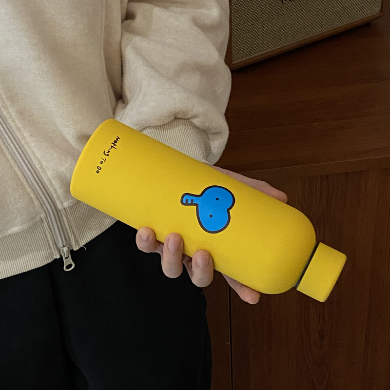 A small yellow heart-shaped elephant insulated cup, a large-capacity, high-quality stainless steel water cup, a cute travel cup, 500ml Item Picture
