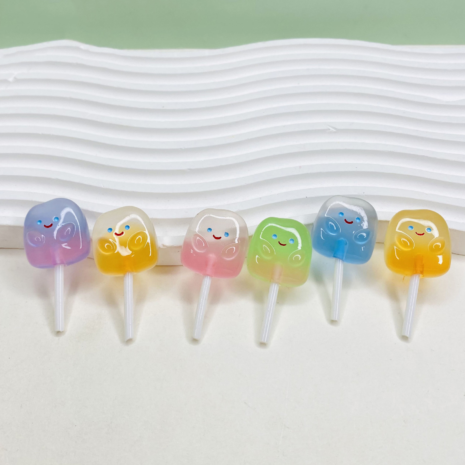 Wholesale of simulated lollipops, colorful smiling faces, luminous resin food and toy accessories, DIY handmade jewelry and accessory materials Specification drawing
