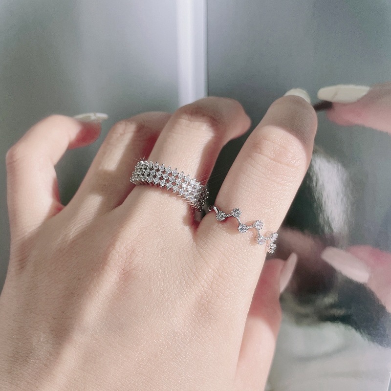 The light luxury hollowed-out full diamond open ring is fashionable, high-end, exquisite and niche design. It has a cold style and is versatile. It's a trendy ring details Picture