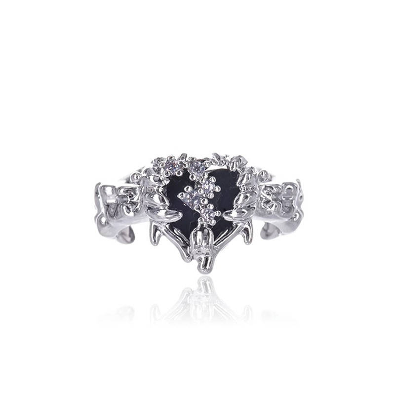 The black heart-shaped open ring set with zircon has an asymmetrical design and texture, presenting a cool and trendy dark style for both men and women Item Picture