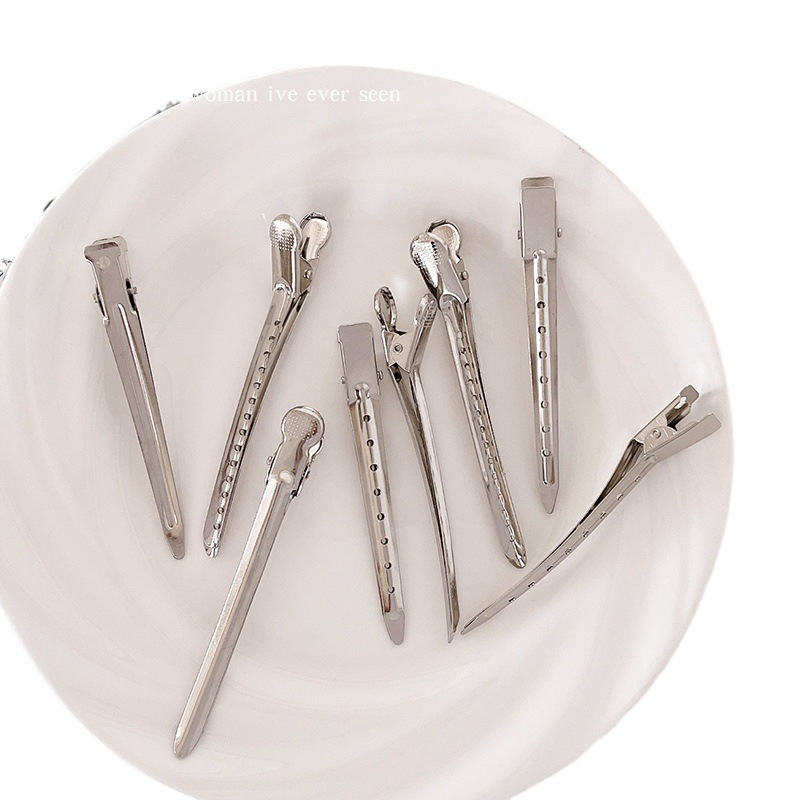 A seamless positioning clip for bangs, a fixed hair clip for hair roots, a duckbill clip for hair sewing, and a must-have for high hair on the top of the head Item Picture