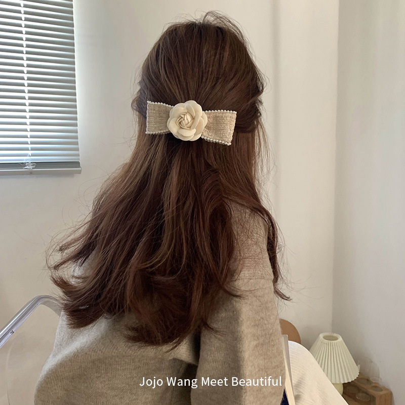 Korean camellia bow hairpin for women, a high-end hair accessory, a spring clip for the back of the head details Picture