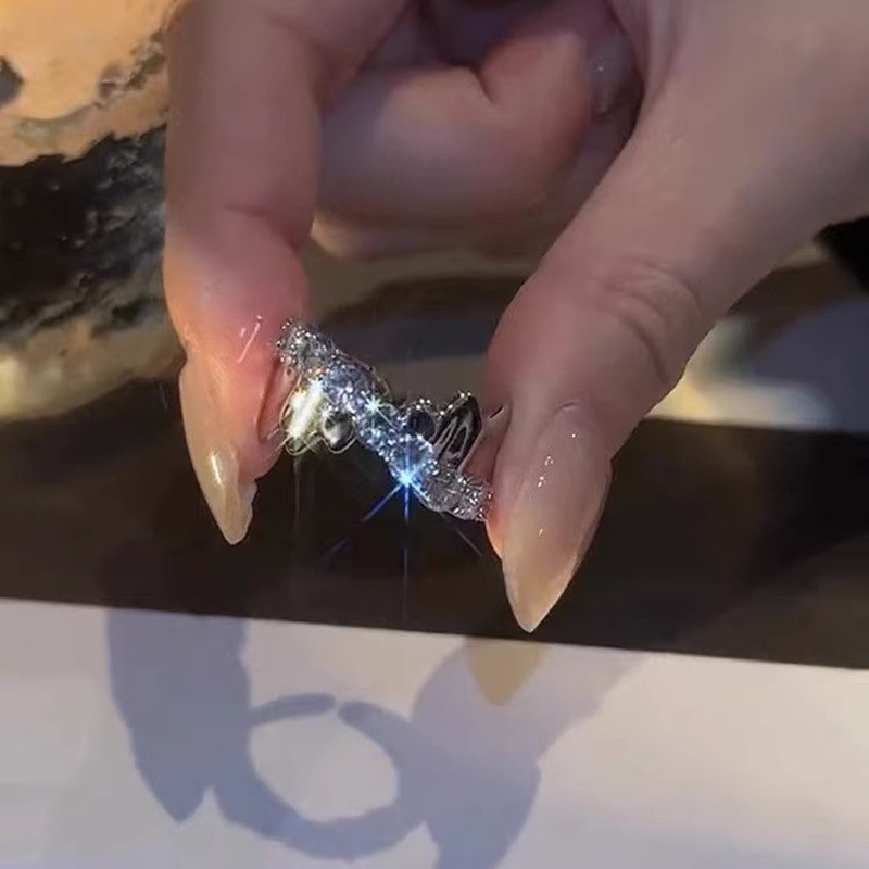 A high-end zircon cross ring for women's ins, with a cold, light luxury and niche design. It's a simple and elegant index finger ring details Picture