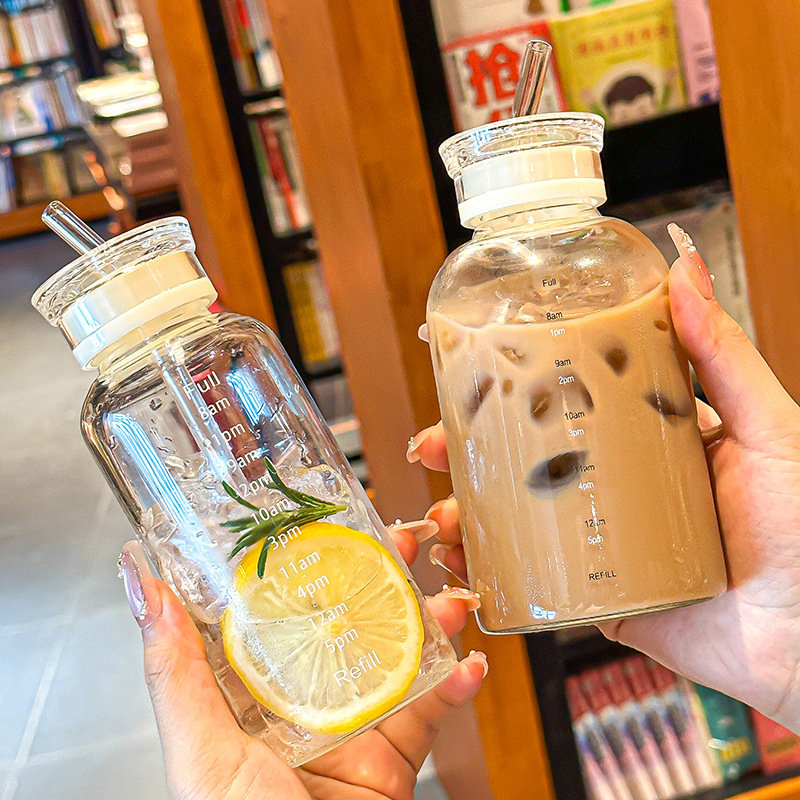 Wholesale of large-capacity graduated glass water cups, high-temperature resistant straws, double-lid fruit tea cups, outdoor couple milk cups for tea brewing Application Scenario