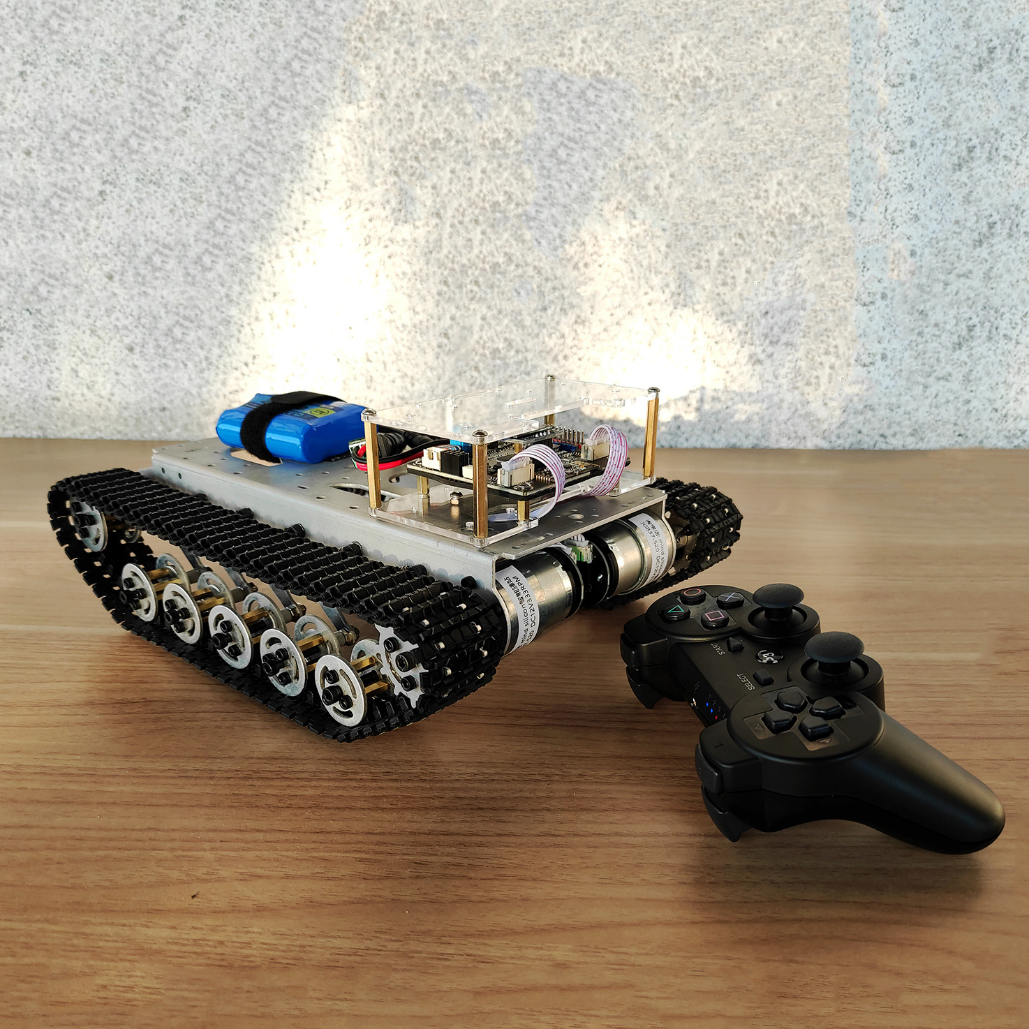 Track-mounted chassis with electronically controlled shock absorption STM32 trolley robot ROS platform Raspberry PI Maker full figure