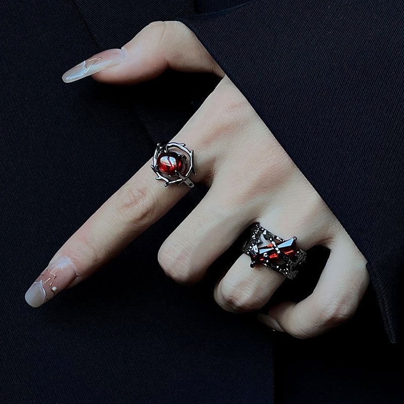 The hollowed-out retro garnet red geometric design ring is a trendy and individualistic dark European and American cold style open ring details Picture