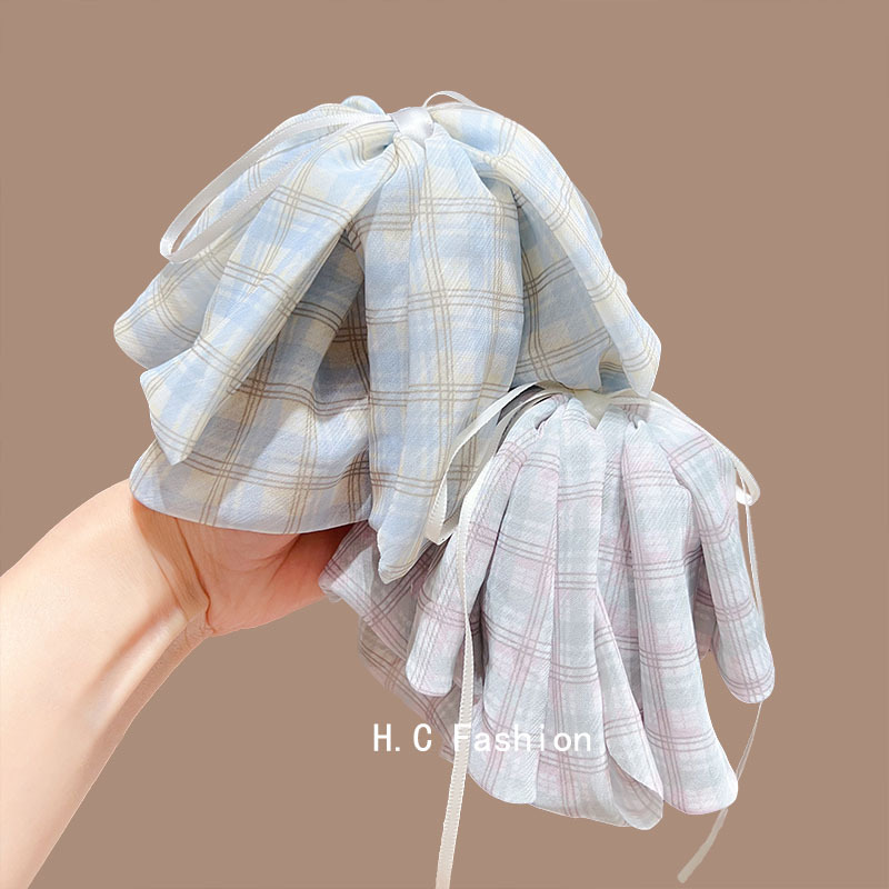 Sweet checkered bow ribbon ponytail clip with a light luxury and high-end feel, new scratch-off hairpin, fashionable hair clip at the back of the head Application Scenario