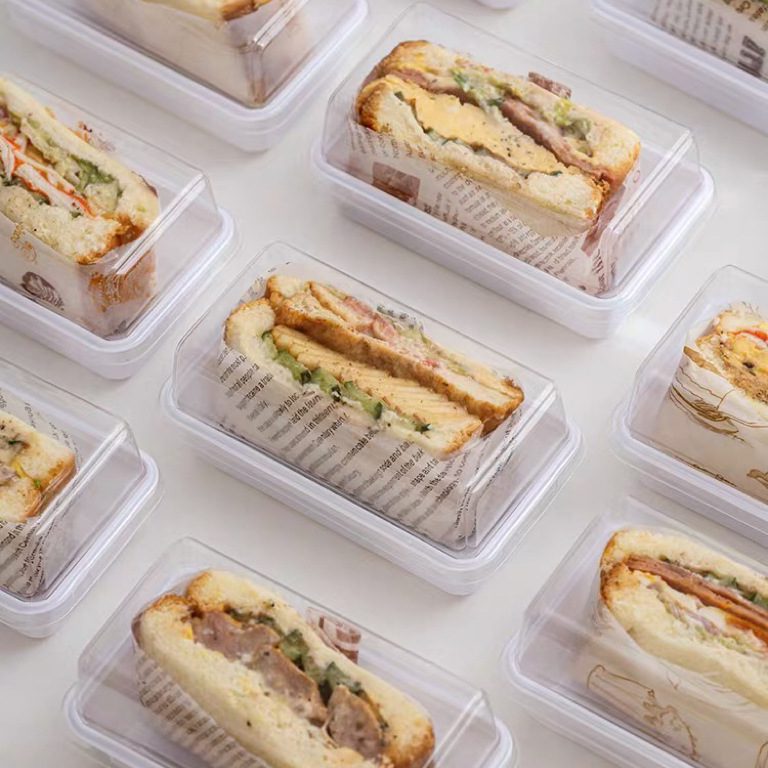 A single transparent packaging box for the popular sandwich cake, cut into pieces, and baked Swiss desserts details Picture