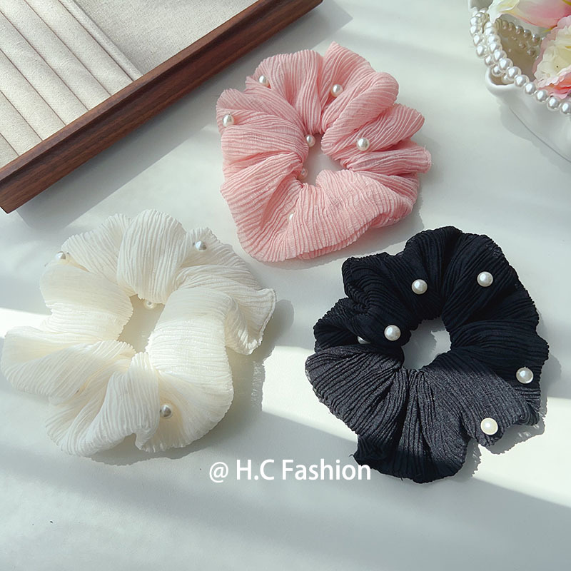 The new French retro pearl mesh pleated hair tie exudes a high-end, unique and simple style for women, featuring a large intestine hair band at the back of the head details Picture