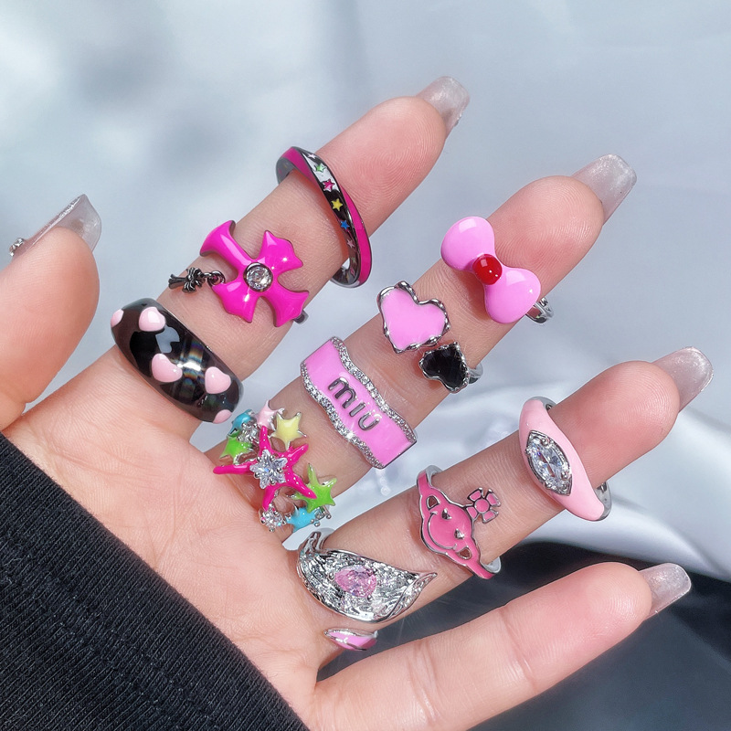 Sweet and cool star cross pink drip glaze open ring for women on Instagram, cold style, high-end and versatile ring Application Scenario