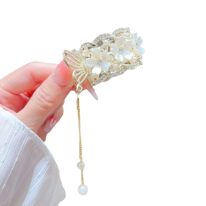 White lotus pearl high ponytail hair clip, small claw clip at the back of the female head, semi-tied hair fixing magic tool, step swing tassel claw clip Item Picture