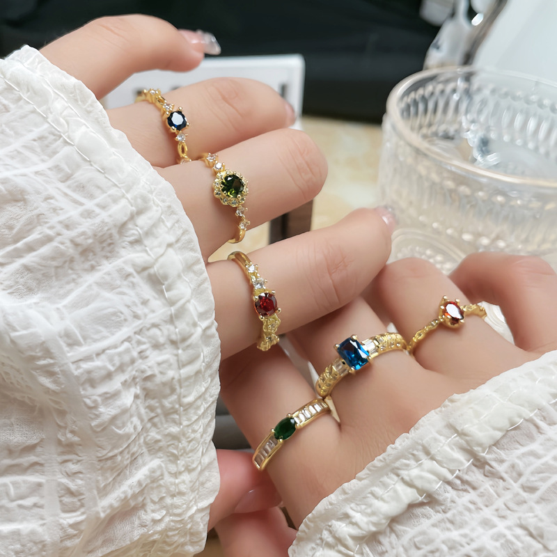 The cross-border colored gemstone series features a light luxury and fashionable open-top ring. It is simple and elegant for women, highlighting a fair complexion and exuding a refined and unique charm. It is a trendy and versatile ring full figure