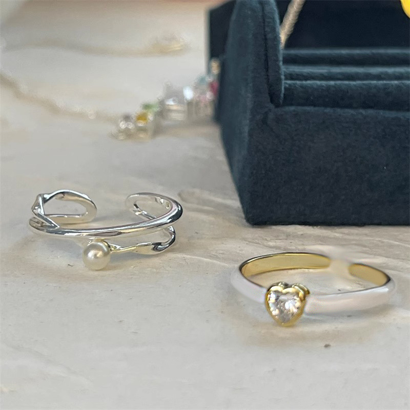 French-style glazed heart-shaped zircon cross-spliced pearl open ring, a fashionable and individual ring with a cold and elegant style for women Application Scenario