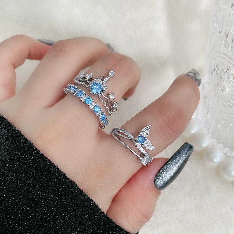 Aquamarine zircon crown with row of diamonds and open ring, a cool and stylish layering ring for women on Instagram, exuding a sweet and sophisticated vibe details Picture