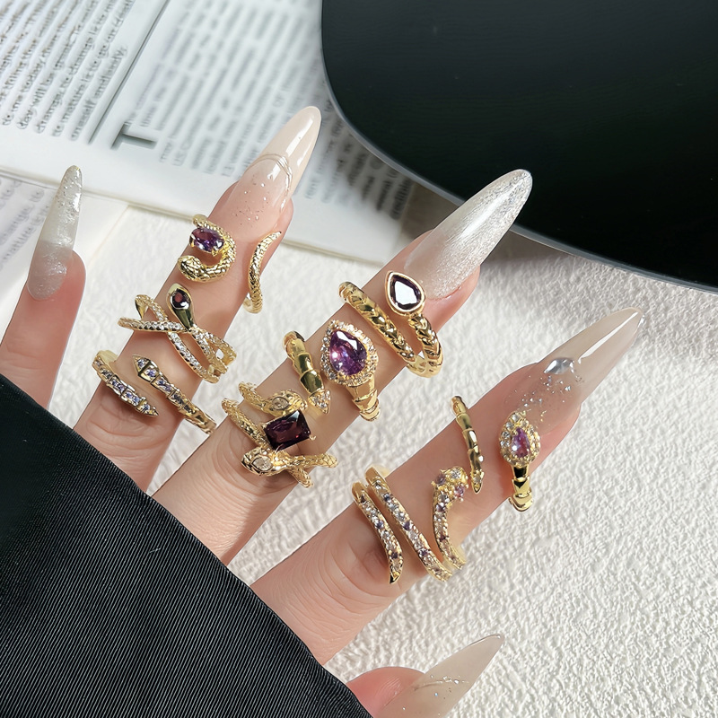 A high-end retro, niche, and sophisticated ring made of gold zircon with adjustable snake-shaped openings for the Year of the Snake Application Scenario