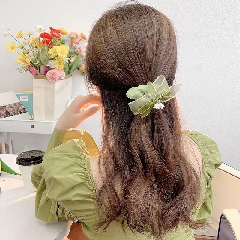 Bow, lily of the valley, flower hair tie, girls' high-end and light luxury style, leather band tie, large intestine circle hair tie Application Scenario