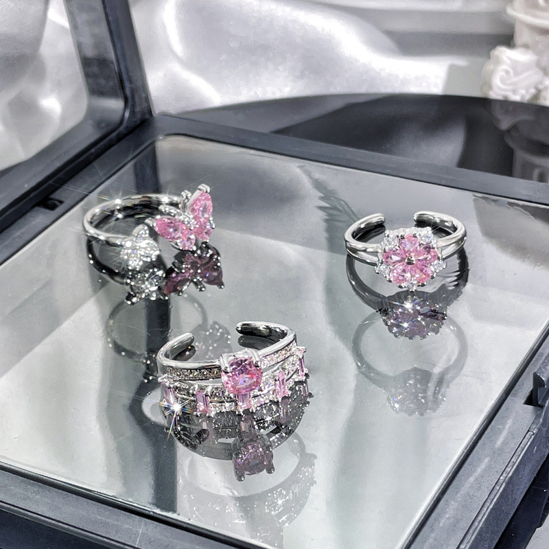 A high-end, light luxury pink diamond butterfly flower open-mouth ring for women, an Instagram cold style, a niche, layered and exquisite ring full figure