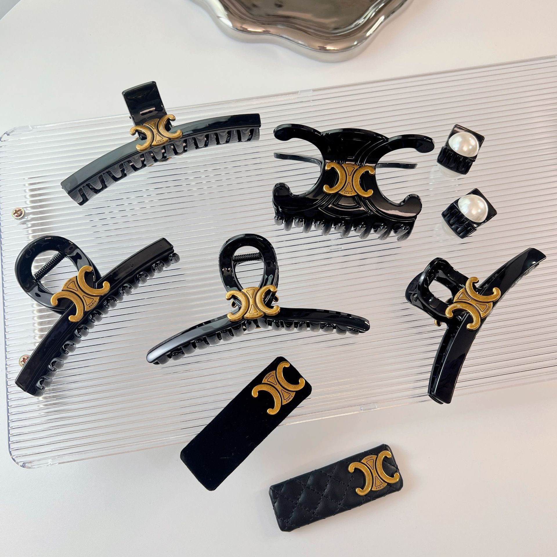 Celi light luxury style Arc de Triomphe black hair clip, high-end retro letter grab clip, acrylic new hair clip and hair accessory full figure