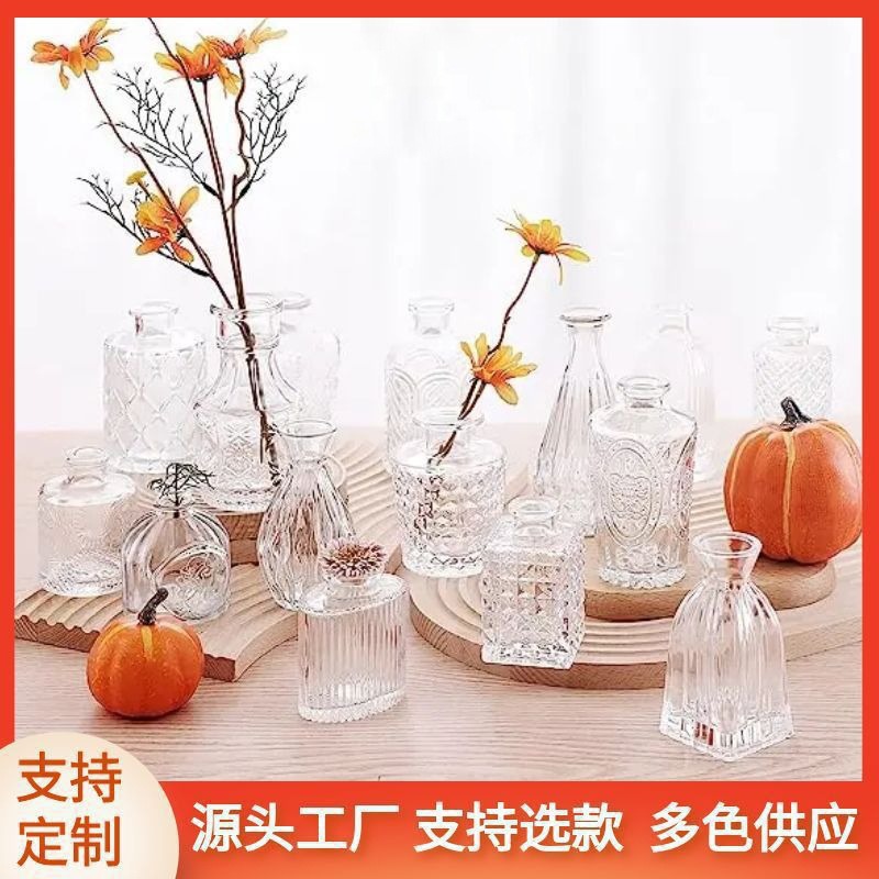 Wholesale manufacturer of exquisite Nordic glass vases, water-cultivated fresh flower decorative mini small vases, high-end flower vase ornaments full figure