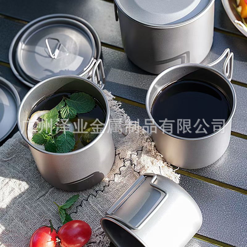 Cross-border export titanium steel mugs, outdoor camping water boiling, lightweight and simple, camping charcoal fire folding handle water cups details Picture