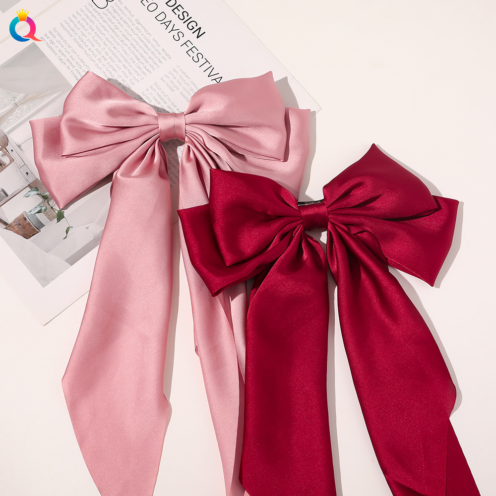 The new cross-border bow ribbon hair clip from Qiyue Korean Edition is a simple and elegant silk silk spring clip hair accessory at the back of the head details Picture