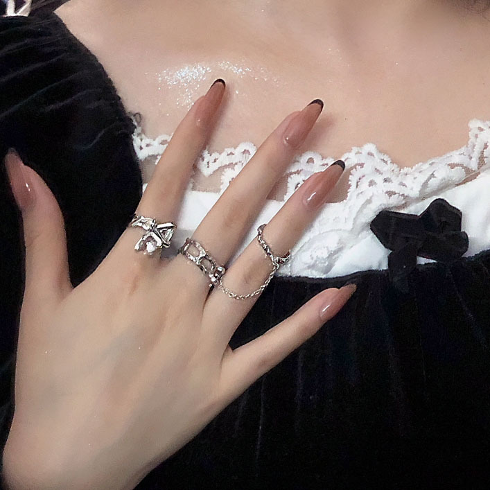 This is a niche design with a high-end and cold style. It features a double-diamond zircon open ring, a unique and fashionable chain ring for women details Picture