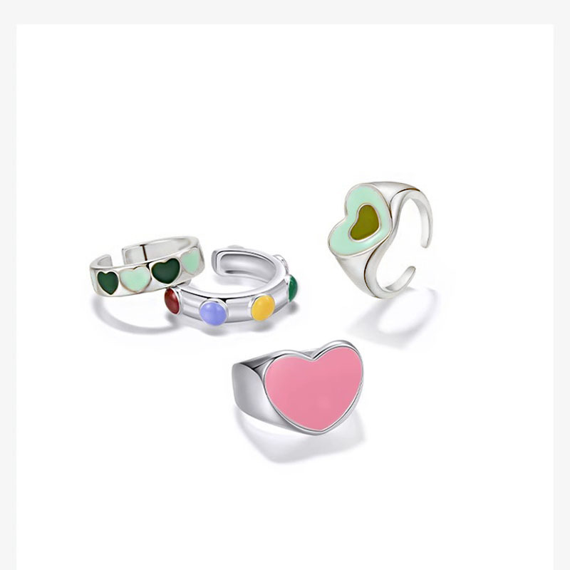 Sweet and cool style heart-shaped opening ring, a niche design for women, a high-end ring with a fashionable and individual green index finger ring set full figure