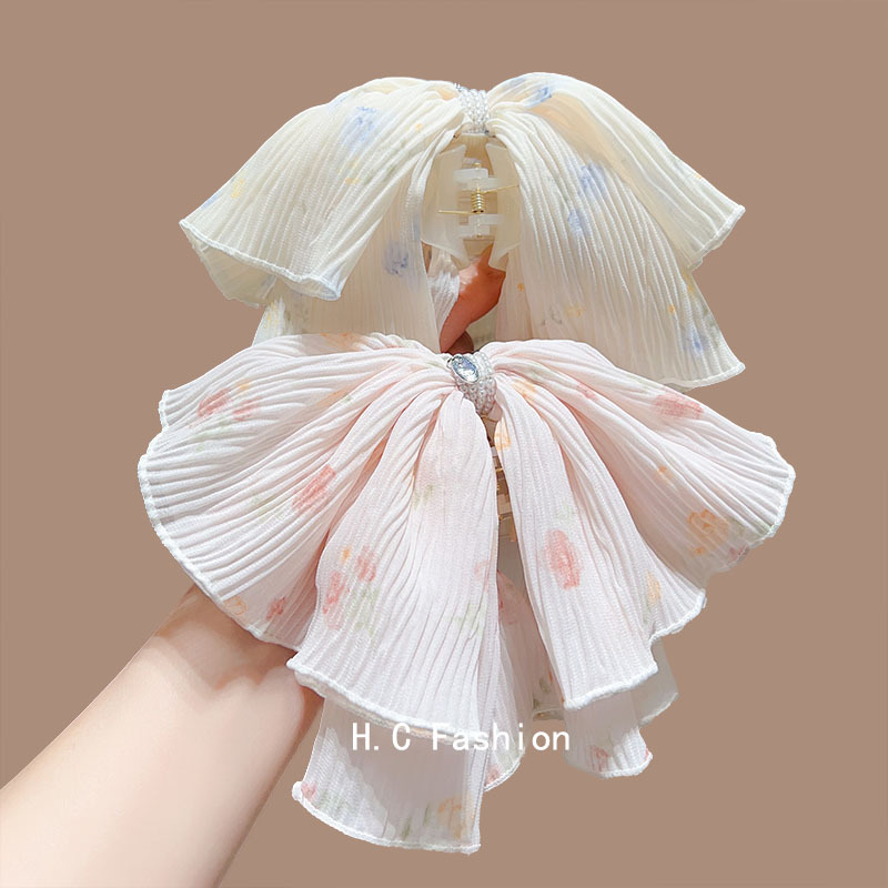 A new Korean floral tie-dye bow hairpin with a high-end feminine touch, a niche Instagram top clip at the back of the head, and a stylish hairpin full figure