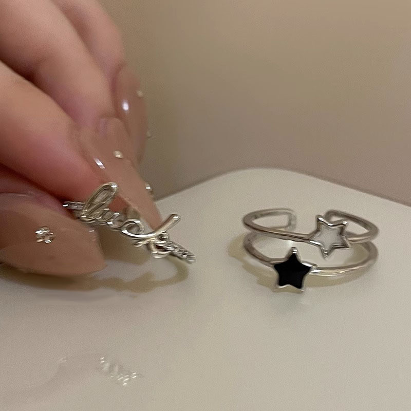 Lucky Star letter zircon ring for women, simple and cold style, niche design ring, fashionable and individual index finger ring Application Scenario