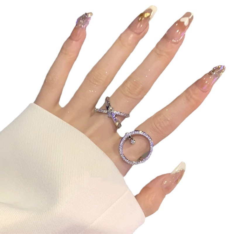 A new, trendy and cool fashion ring for a woman's Instagram, featuring multi-layered zirconia and an open-top design Item Picture