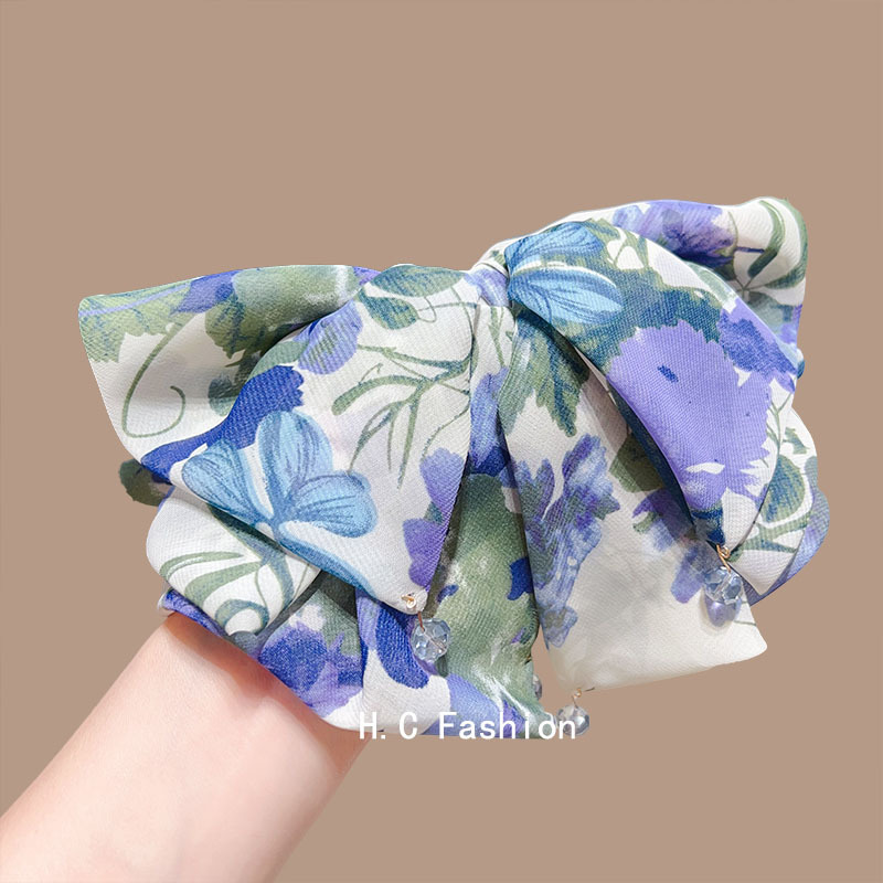 A new style of elegant bow ponytail print grabber for women with a high-end retro back head updo shark clip accessory Specification drawing