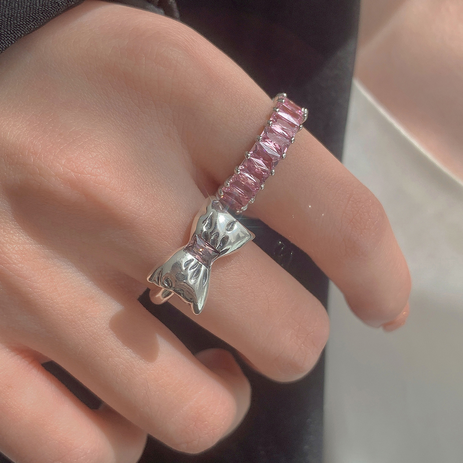 A niche design with a high-end feel, pink diamond zircon bow open ring, a light luxury and cold style for women, and a sweet and cool personality details Picture