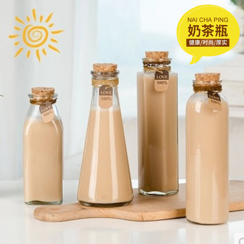 Factory direct delivery: milk tea bottles, cold-brewed tea, glass beverage bottles, message bottles, flower tea bottles, wishing wooden stopper glass bottles full figure