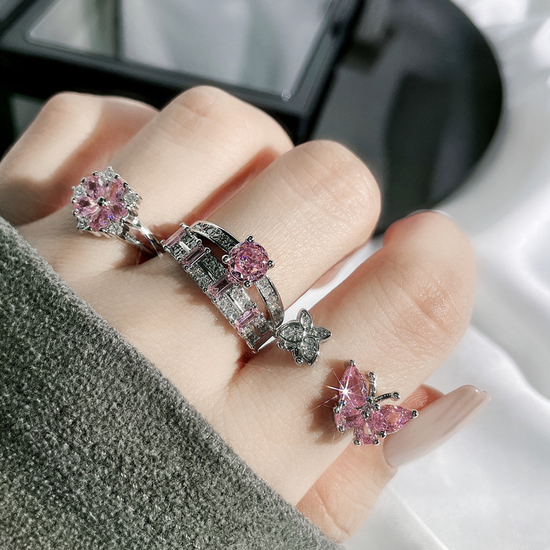 A high-end, light luxury pink diamond butterfly flower open-mouth ring for women, an Instagram cold style, a niche, layered and exquisite ring Application Scenario