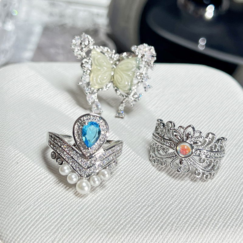 New Chinese-style court-style chalcedony butterfly high-end ring, women's hollowed-out light luxury water drop sea blue zircon exquisite ring Application Scenario