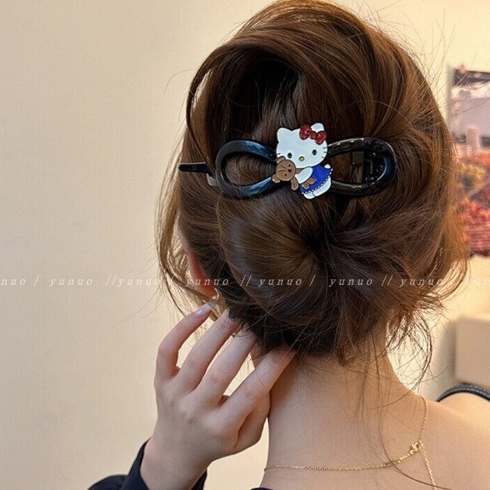 Sweet and cute cartoon cat hairpin twist clip 2025 new style one-line scratch-off clip for women with a high-end look at the back of the head full figure