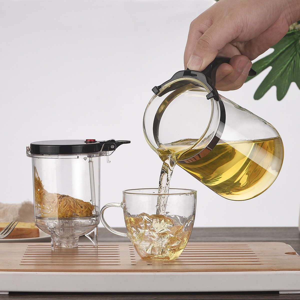 High borosilicate heat-resistant glass teapot, tea-water separation flowing cup, office glass teapot, transparent flower teapot details Picture