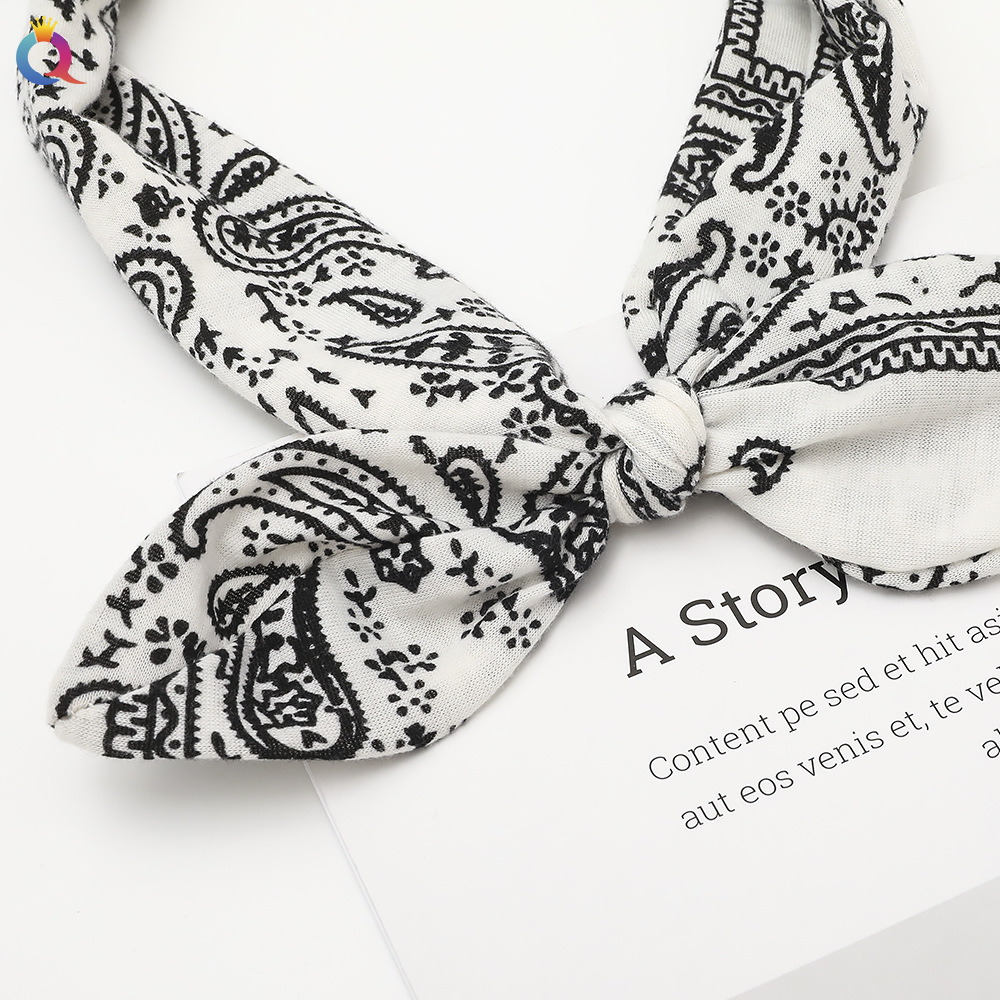 Qiyue's new cross-border rabbit ear knot elastic headband 6-color elastic headband steel wire fixed women's hair accessory Application Scenario