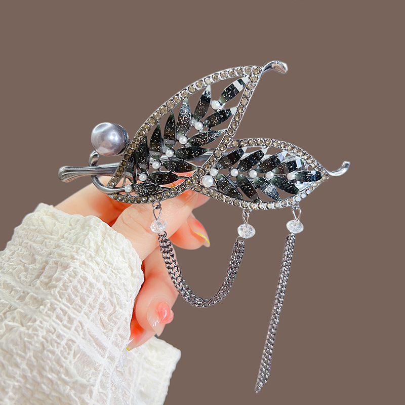 Retro black leaf tassel twist hair clip at the back of the head, new super fairy updo one-button, high-end frog clip details Picture