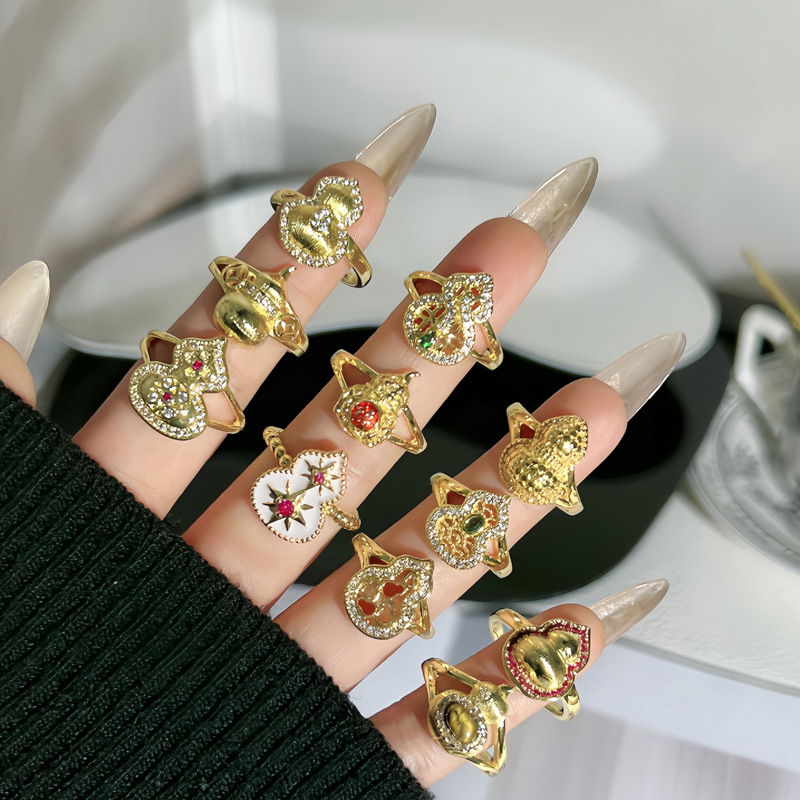 The ancient and new Chinese style golden gourd enamel ring is a niche design for women, with a light luxury and high-end feel, and a sweet and cool temperament full figure