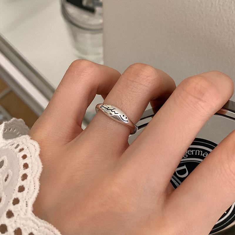 The new 2023 smiling face lace ring is a fashionable, simple, individual, versatile and high-end open-top adjustable index finger ring full figure