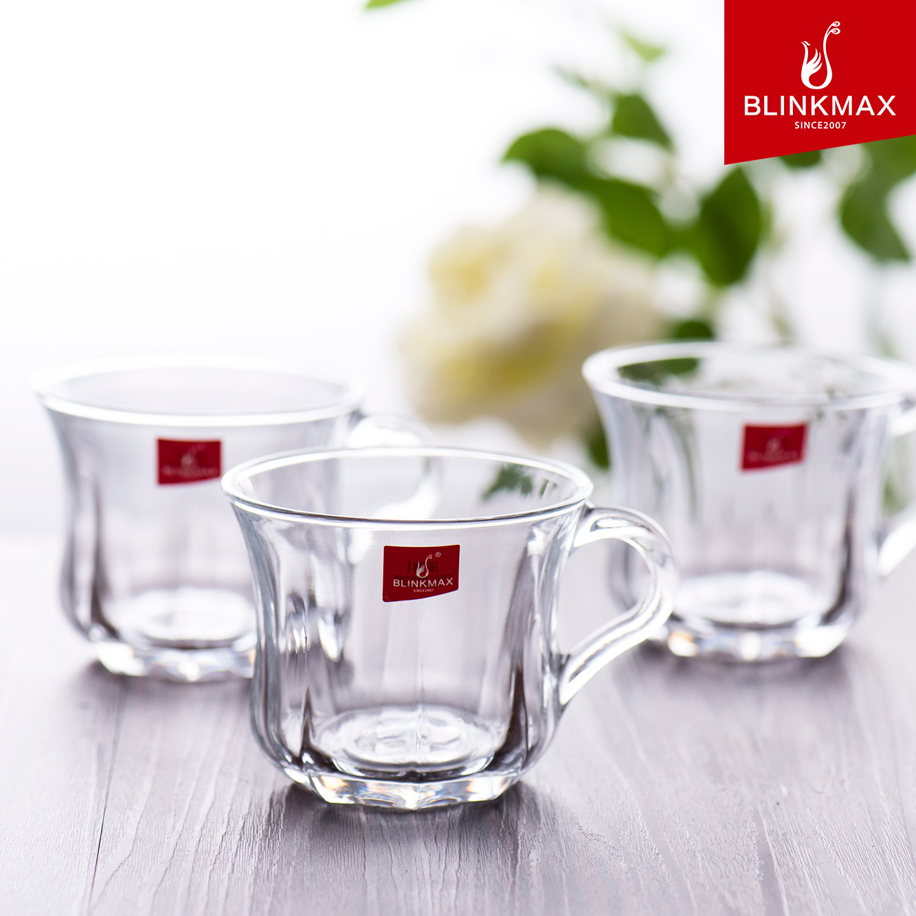 Wholesale of cross-border export small handle cups, thickened heat-resistant flower tea cups, beverage cups, milk cups, water cups with handles, and glass cups full figure