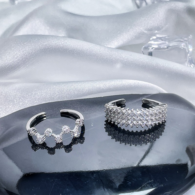 The light luxury hollowed-out full diamond open ring is fashionable, high-end, exquisite and niche design. It has a cold style and is versatile. It's a trendy ring Application Scenario