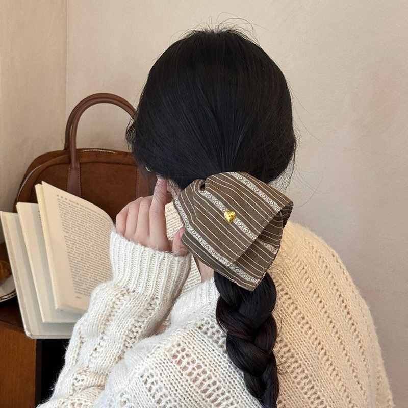 Korean-style fabric striped square scarf hair tie, a new high-end and elegant hair tie, hair flower and hair accessory by a female Internet celebrity in 2025 Application Scenario