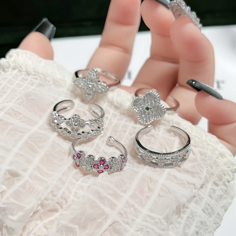 A new Korean-style light luxury four-leaf clover full-diamond open ring for women's Instagram, with a cold and unique style and exquisite index finger ring details Picture