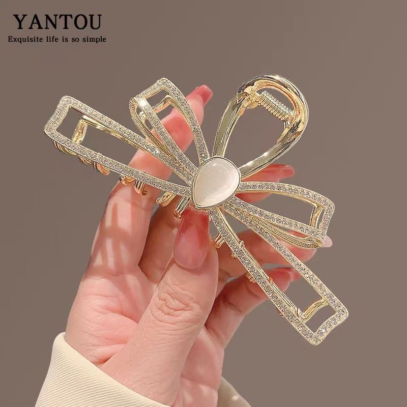 French large back head bun hair clip, sweet and elegant bow, cat's eye stone water diamond hair clip, female shark clip details Picture