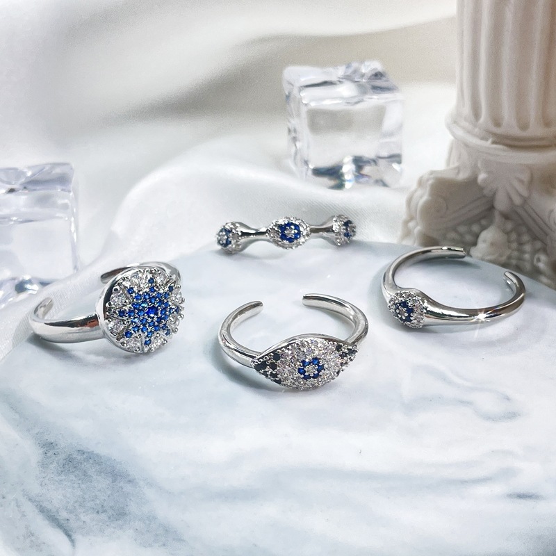 A delicate blue zircon color contrast irregular geometric open ring for women's ins, with a cold and niche design sense full figure
